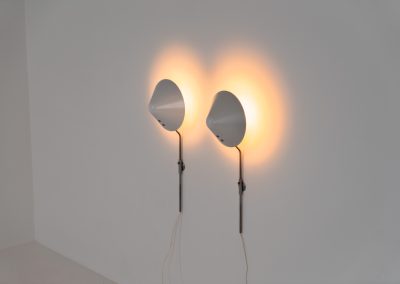 Stunning pair of “VIP” wall lights by Jørgen Gammelgaard for Pandul (Denmark, 1980s). These sleek wall lights are highly adjustable, both in height, angle and shade position. They are in very good condition, and marked by maker.
