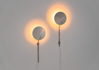 Stunning pair of “VIP” wall lights by Jørgen Gammelgaard for Pandul (Denmark, 1980s). These sleek wall lights are highly adjustable, both in height, angle and shade position. They are in very good condition, and marked by maker.