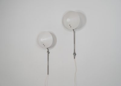 Stunning pair of “VIP” wall lights by Jørgen Gammelgaard for Pandul (Denmark, 1980s). These sleek wall lights are highly adjustable, both in height, angle and shade position. They are in very good condition, and marked by maker.