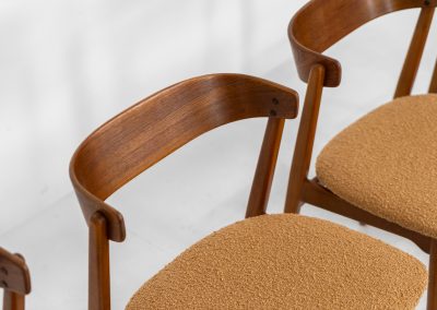 Set of 4 stunning ‘model 206’ dining chairs by Thomas Harlev for Farstrup (Denmark, 1960s). A beautiful design featuring a generously curved teak back rest and a solid beech frame with sleek lines. The chairs are newly upholstered in a orange/brown bouclé fabric. All chairs are in very good condition!