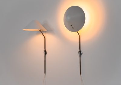 Stunning pair of “VIP” wall lights by Jørgen Gammelgaard for Pandul (Denmark, 1980s). These sleek wall lights are highly adjustable, both in height, angle and shade position. They are in very good condition, and marked by maker.