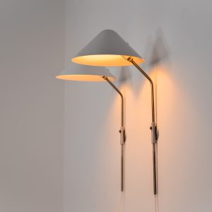 Stunning pair of “VIP” wall lights by Jørgen Gammelgaard for Pandul (Denmark, 1980s). These sleek wall lights are highly adjustable, both in height, angle and shade position. They are in very good condition, and marked by maker.
