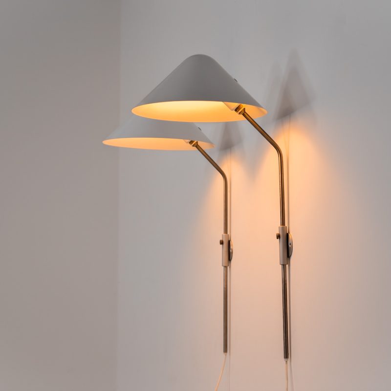 Stunning pair of “VIP” wall lights by Jørgen Gammelgaard for Pandul (Denmark, 1980s). These sleek wall lights are highly adjustable, both in height, angle and shade position. They are in very good condition, and marked by maker.