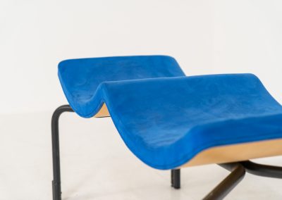 Rare “Sea” bench by Rud Thygesen & Johnny Sørensen for Magnus Olesen (Denmark, 1980s). A beautiful two-seater bench consisting of a black metal frame paired with a wavy seat upholstered in a blue fabric That adds a bold yet refined accent. The bench remains in very good condition and is marked by maker.