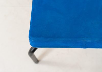 Rare “Sea” bench by Rud Thygesen & Johnny Sørensen for Magnus Olesen (Denmark, 1980s). A beautiful two-seater bench consisting of a black metal frame paired with a wavy seat upholstered in a blue fabric That adds a bold yet refined accent. The bench remains in very good condition and is marked by maker.