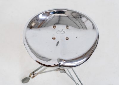 Rare pair of Dulton stools by Yasu Satamoto for Dulton Co. (Japan, 1970s). A striking and unconventional pair of chrome stools designed by experimental Japanese designer Yasu Satamoto for Dulton Co. The concept is both playful and industrial: a sculptural tractor seat mounted onto a drummer’s stool base, executed in stainless steel. The stools are easily foldable and collapsible, making them practical as well as visually distinctive. They remain in good vintage condition, showing a beautiful patina with light, age-related rust marks. We have chosen to preserve this finish to enhance their authentic character, but they can of course be polished and the rust removed upon request.