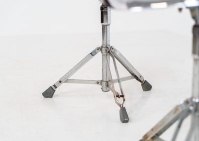 Rare pair of Dulton stools by Yasu Satamoto for Dulton Co. (Japan, 1970s). A striking and unconventional pair of chrome stools designed by experimental Japanese designer Yasu Satamoto for Dulton Co. The concept is both playful and industrial: a sculptural tractor seat mounted onto a drummer’s stool base, executed in stainless steel. The stools are easily foldable and collapsible, making them practical as well as visually distinctive. They remain in good vintage condition, showing a beautiful patina with light, age-related rust marks. We have chosen to preserve this finish to enhance their authentic character, but they can of course be polished and the rust removed upon request.