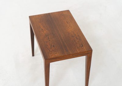 Side table in rosewood by Severin Hansen for Haslev Møbelfabrik (Denmark, 1960s). A beautifully crafted side table made from rich rosewood, showcasing a stunning woodgrain grain and an elegant, minimalist design. The stemless joinery between the table top and legs is a testament to exceptional craftsmanship and a signature technique of Severin Hansen. Presented in good vintage condition with only light, age-appropriate wear.