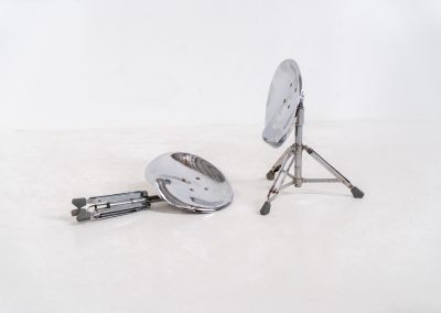Rare pair of Dulton stools by Yasu Satamoto for Dulton Co. (Japan, 1970s). A striking and unconventional pair of chrome stools designed by experimental Japanese designer Yasu Satamoto for Dulton Co. The concept is both playful and industrial: a sculptural tractor seat mounted onto a drummer’s stool base, executed in stainless steel. The stools are easily foldable and collapsible, making them practical as well as visually distinctive. They remain in good vintage condition, showing a beautiful patina with light, age-related rust marks. We have chosen to preserve this finish to enhance their authentic character, but they can of course be polished and the rust removed upon request.