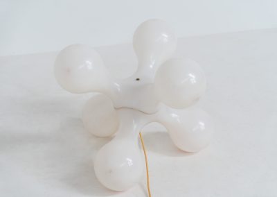 Atomium floor lamp by Benjamin Hopf & Constantin Wortmann for Kundalini (Italy, 1990s). Inspired by the iconic Atomium in Brussels, this striking lamp features a molded plastic structure with six internal light sources, creating a warm and atmospheric glow. The piece is versatile and can be used both as a floor lamp or as a large pendant light. It remains in good vintage condition, with visible signs of use including scratches and some purple marks that could not be removed.