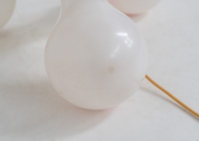 Atomium floor lamp by Benjamin Hopf & Constantin Wortmann for Kundalini (Italy, 1990s). Inspired by the iconic Atomium in Brussels, this striking lamp features a molded plastic structure with six internal light sources, creating a warm and atmospheric glow. The piece is versatile and can be used both as a floor lamp or as a large pendant light. It remains in good vintage condition, with visible signs of use including scratches and some purple marks that could not be removed.