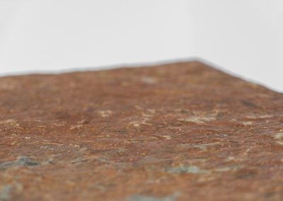 Brutalist Coffee Table in Norwegian Slate stone, 1970s A very powerful Brutalist coffee table from the 1970s, defined by its strong architectural presence and sculptural simplicity. The substantial tabletop is crafted from Norwegian slate, showcasing a rich and varied surface with natural tonal shifts that create depth and visual texture. The solid stone top is supported by a black lacquered metal base, offering a bold contrast while reinforcing the table’s grounded and monolithic character. The table remains in very good condition, with light, age-appropriate wear such as minor scratches to the frame.