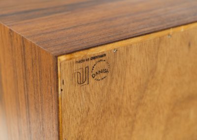 Chest of drawers by Poul Hundevad for Hundevad & Co (Denmark, 1970s). This iconic and hard to find model with amazing dimensions features eight drawers with nice sculptural handles. It is in very good condition with a subtle color difference on the top. Marked by maker.