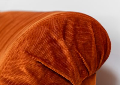 Modular sofa by Doimo Salotti (Italy, 1970s). Striking and bold modular seating system consisting of three identical elements and one corner piece, upholstered in their original vivid orange velvet. Can be arranged as a sofa or used as individual lounge chairs. Low, sculptural design with generous padding, offering both strong visual impact and excellent comfort. Professionally deep-cleaned and in very good original condition, with minor age-related wear. Some cracks to the underside dust covers (purely cosmetic, no impact on use or structure). Marked by maker.