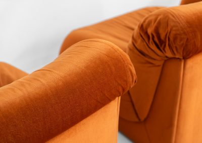 Modular sofa by Doimo Salotti (Italy, 1970s). Striking and bold modular seating system consisting of three identical elements and one corner piece, upholstered in their original vivid orange velvet. Can be arranged as a sofa or used as individual lounge chairs. Low, sculptural design with generous padding, offering both strong visual impact and excellent comfort. Professionally deep-cleaned and in very good original condition, with minor age-related wear. Some cracks to the underside dust covers (purely cosmetic, no impact on use or structure). Marked by maker.