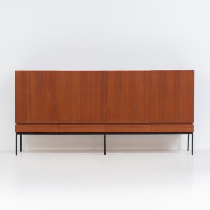 Iconic B60 sideboard by Dieter Waeckerlin for Behr (Germany, 1950s). This highly sought after and significant “B60” sideboard is a masterful blend of minimalistic design and functional elegance. It’s unbelievable this piece was made in the 50’s and is yet so timeless. It contains four drawers and four doors with a minimal gap between them. The inside offers lots of storage space with adjustable shelves. It is in amazing condition with minor sings of use and age.