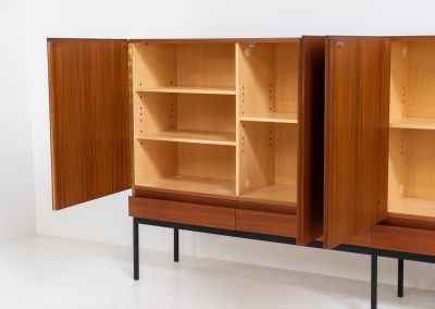 Iconic B60 sideboard by Dieter Waeckerlin for Behr (Germany, 1950s). This highly sought after and significant “B60” sideboard is a masterful blend of minimalistic design and functional elegance. It’s unbelievable this piece was made in the 50’s and is yet so timeless. It contains four drawers and four doors with a minimal gap between them. The inside offers lots of storage space with adjustable shelves. It is in amazing condition with minor sings of use and age.