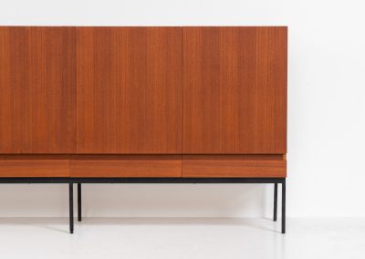 Iconic B60 sideboard by Dieter Waeckerlin for Behr (Germany, 1950s). This highly sought after and significant “B60” sideboard is a masterful blend of minimalistic design and functional elegance. It’s unbelievable this piece was made in the 50’s and is yet so timeless. It contains four drawers and four doors with a minimal gap between them. The inside offers lots of storage space with adjustable shelves. It is in amazing condition with minor sings of use and age.