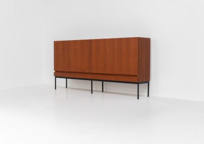 Iconic B60 sideboard by Dieter Waeckerlin for Behr (Germany, 1950s). This highly sought after and significant “B60” sideboard is a masterful blend of minimalistic design and functional elegance. It’s unbelievable this piece was made in the 50’s and is yet so timeless. It contains four drawers and four doors with a minimal gap between them. The inside offers lots of storage space with adjustable shelves. It is in amazing condition with minor sings of use and age.