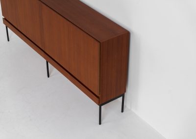 Iconic B60 sideboard by Dieter Waeckerlin for Behr (Germany, 1950s). This highly sought after and significant “B60” sideboard is a masterful blend of minimalistic design and functional elegance. It’s unbelievable this piece was made in the 50’s and is yet so timeless. It contains four drawers and four doors with a minimal gap between them. The inside offers lots of storage space with adjustable shelves. It is in amazing condition with minor sings of use and age.