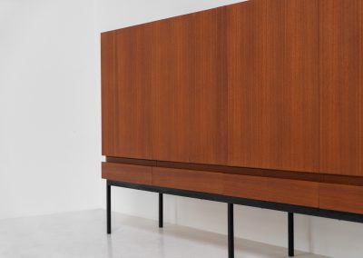 Iconic B60 sideboard by Dieter Waeckerlin for Behr (Germany, 1950s). This highly sought after and significant “B60” sideboard is a masterful blend of minimalistic design and functional elegance. It’s unbelievable this piece was made in the 50’s and is yet so timeless. It contains four drawers and four doors with a minimal gap between them. The inside offers lots of storage space with adjustable shelves. It is in amazing condition with minor sings of use and age.