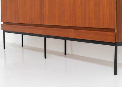 Iconic B60 sideboard by Dieter Waeckerlin for Behr (Germany, 1950s). This highly sought after and significant “B60” sideboard is a masterful blend of minimalistic design and functional elegance. It’s unbelievable this piece was made in the 50’s and is yet so timeless. It contains four drawers and four doors with a minimal gap between them. The inside offers lots of storage space with adjustable shelves. It is in amazing condition with minor sings of use and age.