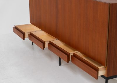 Iconic B60 sideboard by Dieter Waeckerlin for Behr (Germany, 1950s). This highly sought after and significant “B60” sideboard is a masterful blend of minimalistic design and functional elegance. It’s unbelievable this piece was made in the 50’s and is yet so timeless. It contains four drawers and four doors with a minimal gap between them. The inside offers lots of storage space with adjustable shelves. It is in amazing condition with minor sings of use and age.