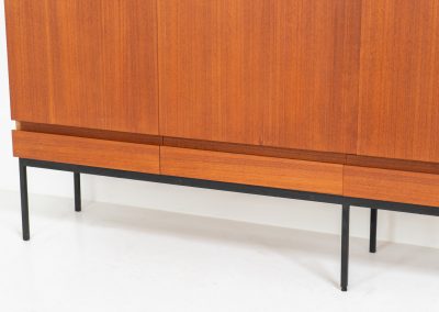 Iconic B60 sideboard by Dieter Waeckerlin for Behr (Germany, 1950s). This highly sought after and significant “B60” sideboard is a masterful blend of minimalistic design and functional elegance. It’s unbelievable this piece was made in the 50’s and is yet so timeless. It contains four drawers and four doors with a minimal gap between them. The inside offers lots of storage space with adjustable shelves. It is in amazing condition with minor sings of use and age.