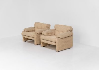 Pair of “Coronado” armchairs by Tobia Scarpa for C&B Italia (Italy, 1970s). These chairs offer a soft, sculptural form and exceptional comfort, upholstered in their original textured wool fabric. Generous proportions and inviting curves make them as comfortable as they are visually striking. In good original condition with some minor using marks. Marked by maker.