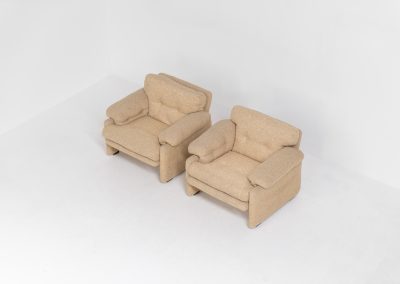 Pair of “Coronado” armchairs by Tobia Scarpa for C&B Italia (Italy, 1970s). These chairs offer a soft, sculptural form and exceptional comfort, upholstered in their original textured wool fabric. Generous proportions and inviting curves make them as comfortable as they are visually striking. In good original condition with some minor using marks. Marked by maker.