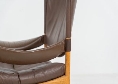 Pair of “Modus” armchairs by Kristian Vedel for Søren Willadsen (Denmark, 1960s). A rare and authentic set of two lounge chairs crafted from solid oak with beautifully detailed joinery. The frames have been carefully refreshed while preserving the wood's original character and warm patina. The brown leather has been cleaned and conditioned, showing attractive age and wear consistent with its vintage nature. A great example of Danish mid-century design, combining elegant sculptural lines with exceptional comfort thanks to the wide seats, suspended leather backs, and generous cushions.
