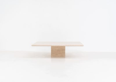 XL travertine coffee table (Italy, 1970s). A beautiful Italian coffee table in travertine, showing a natural grain and warm tones that highlight the character of the stone. Its clean and minimal design gives it a timeless and easy look that fits in many interiors. The table is in excellent condition, with no cracks, chips, or other damage. Important: please check the measurements carefully, as this is a large and very heavy piece.