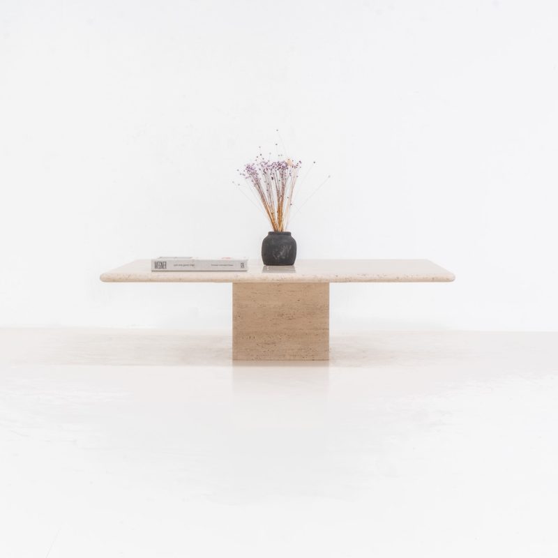 XL travertine coffee table (Italy, 1970s). A beautiful Italian coffee table in travertine, showing a natural grain and warm tones that highlight the character of the stone. Its clean and minimal design gives it a timeless and easy look that fits in many interiors. The table is in excellent condition, with no cracks, chips, or other damage. Important: please check the measurements carefully, as this is a large and very heavy piece.