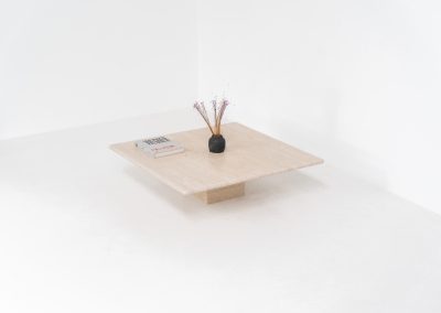 XL travertine coffee table (Italy, 1970s). A beautiful Italian coffee table in travertine, showing a natural grain and warm tones that highlight the character of the stone. Its clean and minimal design gives it a timeless and easy look that fits in many interiors. The table is in excellent condition, with no cracks, chips, or other damage. Important: please check the measurements carefully, as this is a large and very heavy piece.