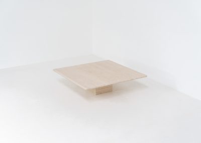 XL travertine coffee table (Italy, 1970s). A beautiful Italian coffee table in travertine, showing a natural grain and warm tones that highlight the character of the stone. Its clean and minimal design gives it a timeless and easy look that fits in many interiors. The table is in excellent condition, with no cracks, chips, or other damage. Important: please check the measurements carefully, as this is a large and very heavy piece.