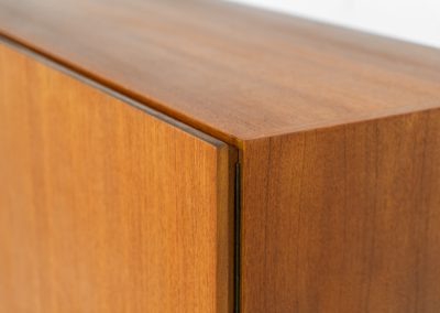 Rare S21 highboard in teak by Dieter Waeckerlin for Behr (Germany, 1950s). Belonging to the same series as the iconic B60, this very hard to find S21 mid sized highboard in teak is a masterful blend of minimalistic design and functional elegance. It’s unbelievable this piece was made in the 50’s and is yet so timeless. It contains two drawers and two doors with a minimal gap between them. The inside offers lots of storage space with adjustable shelves. It is in amazing condition with minimal sings of use and age.