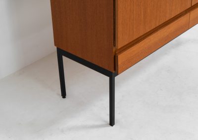 Rare S21 highboard in teak by Dieter Waeckerlin for Behr (Germany, 1950s). Belonging to the same series as the iconic B60, this very hard to find S21 mid sized highboard in teak is a masterful blend of minimalistic design and functional elegance. It’s unbelievable this piece was made in the 50’s and is yet so timeless. It contains two drawers and two doors with a minimal gap between them. The inside offers lots of storage space with adjustable shelves. It is in amazing condition with minimal sings of use and age.