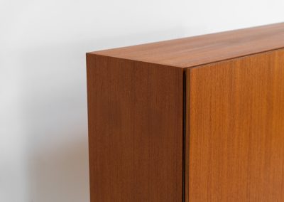 Rare S21 highboard in teak by Dieter Waeckerlin for Behr (Germany, 1950s). Belonging to the same series as the iconic B60, this very hard to find S21 mid sized highboard in teak is a masterful blend of minimalistic design and functional elegance. It’s unbelievable this piece was made in the 50’s and is yet so timeless. It contains two drawers and two doors with a minimal gap between them. The inside offers lots of storage space with adjustable shelves. It is in amazing condition with minimal sings of use and age.