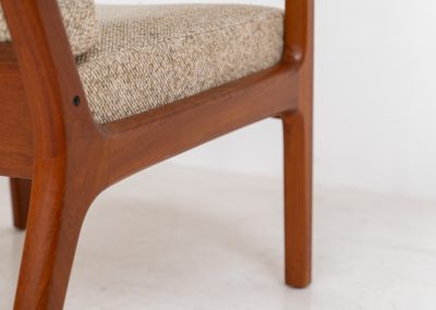 Pair of “Senator” easy chairs by Ole Wanscher for France & Son (Denmark, 1960s). An elegant pair of easy chairs and a fine example of Scandinavian Modernism. They feature a solid teak frame with a warm, natural grain, beautifully sculpted curves, and comfortable cushions upholstered in their original beige wool fabric. The chairs present beautifully and are in mint condition, fully labeled by the maker.
