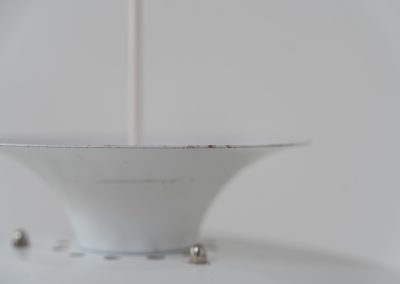 Pendant light by Form Light (Denmark, 1970s). The lamp is crafted out of five metal shades and gives a stunning light dispersion. In good condition with some minor rust stains and paint scratches consistent with its Age.