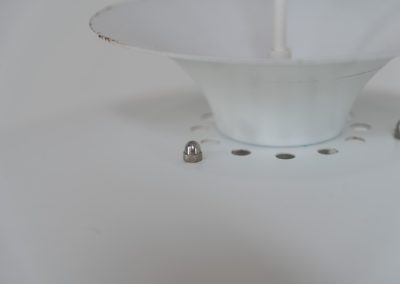 Pendant light by Form Light (Denmark, 1970s). The lamp is crafted out of five metal shades and gives a stunning light dispersion. In good condition with some minor rust stains and paint scratches consistent with its Age.