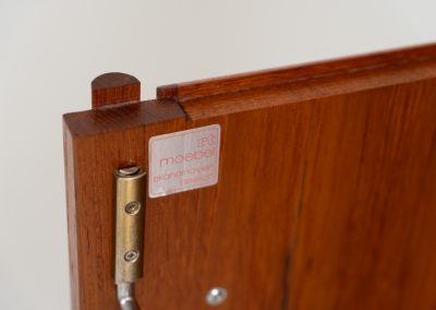 Highboard with tambour doors by Heinrich Riestenpatt for RT Möbel (Germany, 1960s). This rarely seen highboard is made by German designer Heinrich Riestenpatt, executed in warm teak. The clean, architectural form is complemented by stunning tambour doors, organic handles and beautifully balanced proportions. A distinctive feature of this piece is the extractable shelve in the cabinet, making it ideal to use for a vinyl player. A timeless example of German modern design, presented in excellent vintage condition.