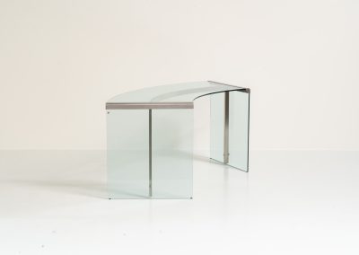 Stunning glass “President” writing desk by Gallotti & Radice (Italy, 1970s). An original 1970s President executive desk, designed by Studio G&R for Gallotti & Radice. This is Italian glass craftsmanship at its finest. Built with heavy, thick tempered glass and structured with solid stainless steel fittings, the design gives a light, almost floating impression while remaining exceptionally sturdy. The desk is in excellent condition with no chips or structural defects.