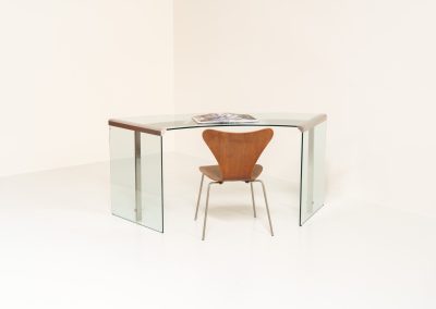 Stunning glass “President” writing desk by Gallotti & Radice (Italy, 1970s). An original 1970s President executive desk, designed by Studio G&R for Gallotti & Radice. This is Italian glass craftsmanship at its finest. Built with heavy, thick tempered glass and structured with solid stainless steel fittings, the design gives a light, almost floating impression while remaining exceptionally sturdy. The desk is in excellent condition with no chips or structural defects.