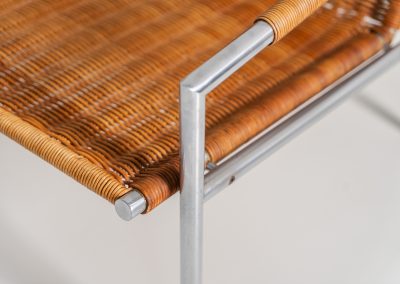 Early pair of modernist “SZ01” arm chairs by Martin Visser for Spectrum (The Netherlands, 1960s). These modernist design icons embody Visser’s minimalistic and functional design philosophy. Featuring a lightweight chromed tubular steel frame and beautiful rattan seats and backrests. Both chairs are in amazing vintage condition, with some visible wear and rust that only enhances their authenticity and charm.