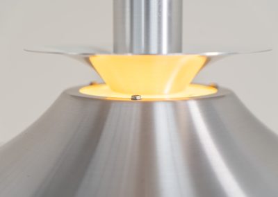 Brushed aluminium pendant light by Frandsen (Denmark, 1970s). A beautiful lamp made out of four aluminium shades and featuring an elegant silhouette. The lamp remains in splendid condition.