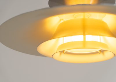 Brushed aluminium pendant light by Frandsen (Denmark, 1970s). A beautiful lamp made out of four aluminium shades and featuring an elegant silhouette. The lamp remains in splendid condition.