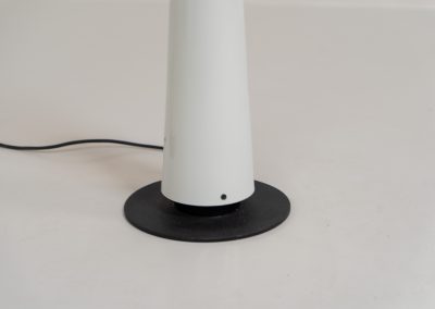 Stunning pair of “Club 1095” floor lamps by Giuseppe Ramella for Arteluce (Italy, 1980s). A beautiful example of Italian minimalist design, the Club 1095 combines a clean, architectural silhouette with a highly functional design. The height of the lamp is adjustable, while the diffuser can be angled to direct the light exactly where it is needed. With their understated presence and timeless aesthetic, these lamps work beautifully in both contemporary and more eclectic interiors, equally striking as a pair or as a standalone piece. Both lamps are in excellent vintage condition. Available individually or as a pair.