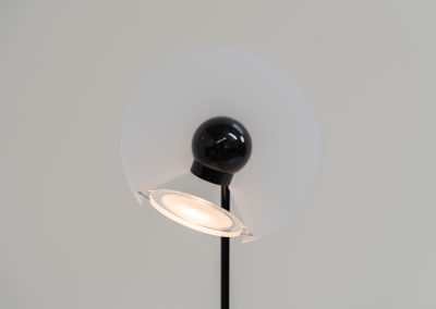 Stunning pair of “Club 1095” floor lamps by Giuseppe Ramella for Arteluce (Italy, 1980s). A beautiful example of Italian minimalist design, the Club 1095 combines a clean, architectural silhouette with a highly functional design. The height of the lamp is adjustable, while the diffuser can be angled to direct the light exactly where it is needed. With their understated presence and timeless aesthetic, these lamps work beautifully in both contemporary and more eclectic interiors, equally striking as a pair or as a standalone piece. Both lamps are in excellent vintage condition. Available individually or as a pair.
