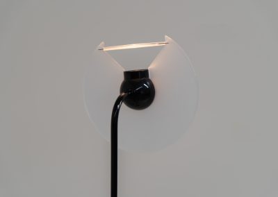 Stunning pair of “Club 1095” floor lamps by Giuseppe Ramella for Arteluce (Italy, 1980s). A beautiful example of Italian minimalist design, the Club 1095 combines a clean, architectural silhouette with a highly functional design. The height of the lamp is adjustable, while the diffuser can be angled to direct the light exactly where it is needed. With their understated presence and timeless aesthetic, these lamps work beautifully in both contemporary and more eclectic interiors, equally striking as a pair or as a standalone piece. Both lamps are in excellent vintage condition. Available individually or as a pair.